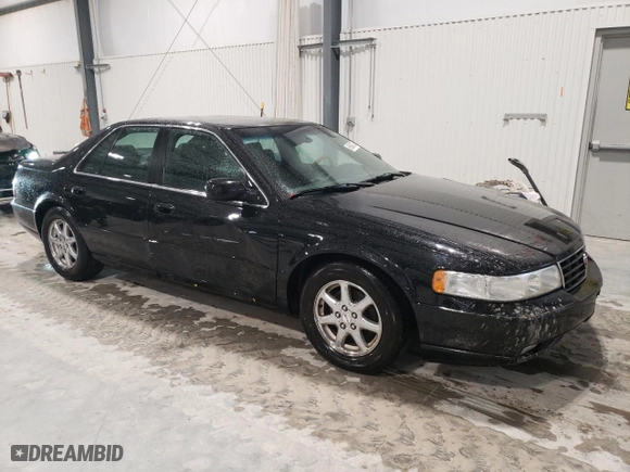 2002 Cadillac Seville Touring STS with VIN 1G6KY54962U158476, listed as a Copart auction lot 86624774 with 77,818 mi miles and Salvage Title. Bid and sale history available at carsss.com. Image 4.