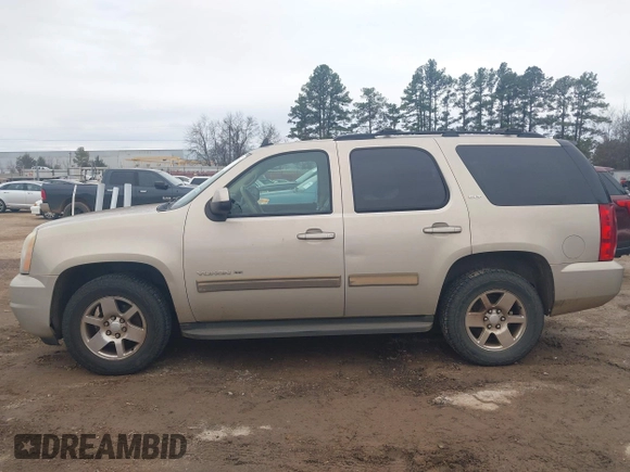 2009 GMC Yukon SLT w/4SA with VIN 1GKEC33379R300278, listed as a IAAI auction lot 41617937 with 240,623 mi miles. Bid and sale history available at carsss.com. Image 14.