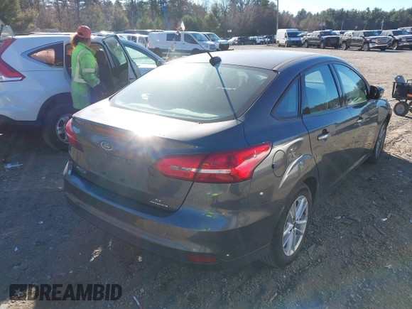 2015 Ford Focus SE with VIN 1FADP3F26FL280298, listed as a IAAI auction lot 40852000 with 144,805 mi miles and . Bid and sale history available at DreamBid. Image 4.