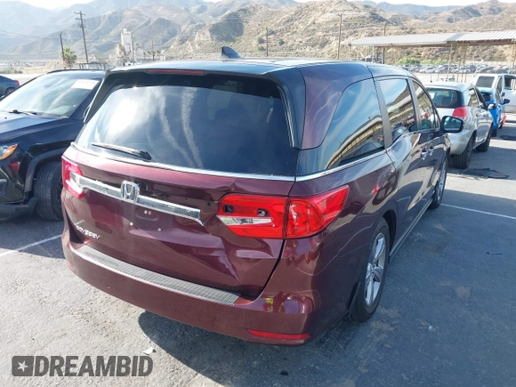 2018 Honda Odyssey EX z VIN 5FNRL6H54JB052364, wystawiony jako IAAI lot #42488415 z przebiegiem 96 971 mil mil oraz . Historia ofert i sprzedaży dostępna na DreamBid. Obrazek 4.