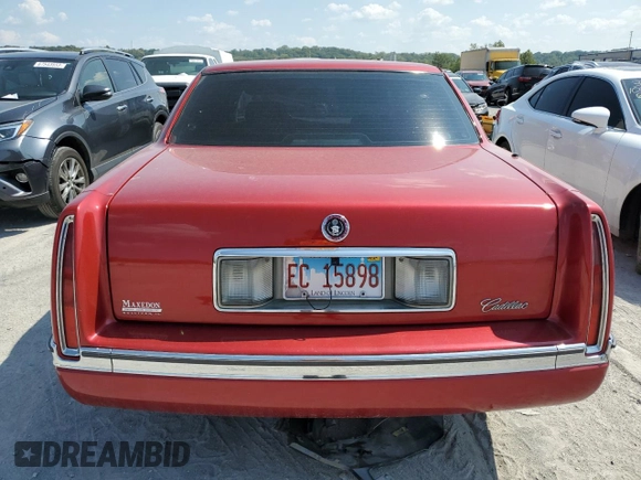 1995 Cadillac DeVille z VIN 1G6KD52B5SU263656, wystawiony jako Copart lot #83631284 z przebiegiem Nie podano mil oraz Szkoda całkowita • Salvage title. Historia ofert i sprzedaży dostępna na DreamBid. Obrazek 6.