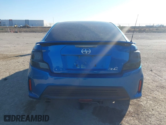 2014 Scion tC with VIN JTKJF5C78E3079618, listed as a IAAI auction lot 41107330 with 112,105 mi miles. Bid and sale history available at carsss.com. Image 17.