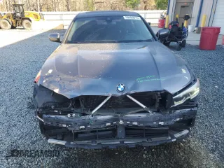 2019 BMW 3 Series 330i xDrive with VIN WBA5R7C56KAJ83409, listed as a Copart auction lot 50089875 with 69,527 mi miles and Salvage Title. Bid and sale history available at carsss.com. Image 5.