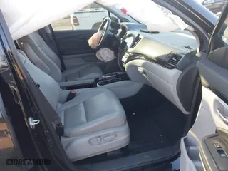 2019 Honda Pilot Touring 7-Passenger with VIN 5FNYF6H65KB061796, listed as a IAAI auction lot 41650857 with 122,417 mi miles. Bid and sale history available at carsss.com. Image 5.