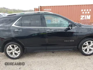 2018 Chevrolet Equinox Premier with VIN 2GNAXVEV7J6275379, listed as a IAAI auction lot 41949962 with 149,329 mi miles and . Bid and sale history available at DreamBid. Image 13.