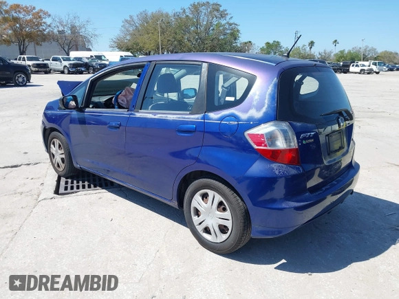 2009 Honda Fit with VIN JHMGE88249S056575, listed as a IAAI auction lot 41702555 with 116,658 mi miles. Bid and sale history available at carsss.com. Image 3.