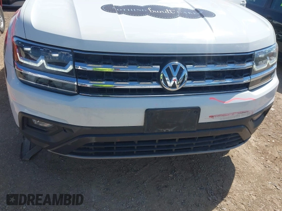 2018 Volkswagen Atlas SE with VIN 1V2CR2CA5JC520616, listed as a IAAI auction lot 42198409 with 98,133 mi miles and . Bid and sale history available at DreamBid. Image 6.