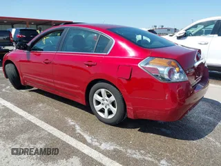 2009 Nissan Altima 2.5 with VIN 1N4AL21E79N467360, listed as a IAAI auction lot 41985550 with 210,485 mi miles. Bid and sale history available at carsss.com. Image 3.