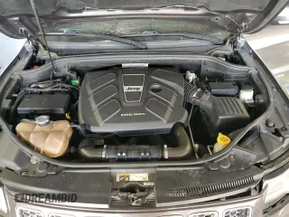 2015 Jeep Grand Cherokee Summit with VIN 1C4RJFJM9FC711776, listed as a Copart auction lot 84464454 with 94,637 mi miles and Salvage Title. Bid and sale history available at carsss.com. Image 12.