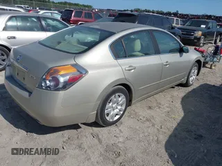 2009 Nissan Altima 2.5 S with VIN 1N4AL21E69N445043, listed as a IAAI auction lot 42141999 with 156,010 mi miles. Bid and sale history available at carsss.com. Image 4.