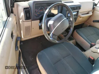 2002 Jeep Wrangler Sahara with VIN 1J4FA59SX2P749398, listed as a Copart auction lot 80524844 with 92,300 mi miles and Clean Title. Bid and sale history available at carsss.com. Image 8.