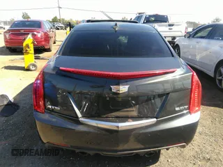 2015 Cadillac ATS Sedan Luxury RWD with VIN 1G6AB5RX5F0101834, listed as a IAAI auction lot 37302564 with 107,046 mi miles. Bid and sale history available at carsss.com. Image 16.