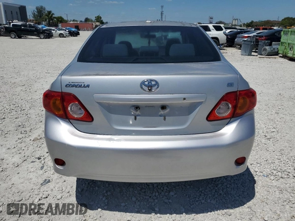 2009 Toyota Corolla with VIN JTDBL40E299062723, listed as a Copart auction lot 52899515 with 183,666 mi miles and Salvage Title. Bid and sale history available at carsss.com. Image 6.