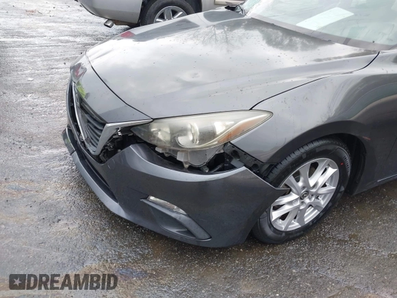 2014 Mazda 3 i Touring with VIN JM1BM1L76E1184728, listed as a IAAI auction lot 41962258 with 200,544 mi miles and . Bid and sale history available at DreamBid. Image 18.