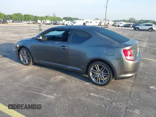 2012 Scion tC with VIN JTKJF5C74C3026945, listed as a IAAI auction lot 41757437 with 104,039 mi miles. Bid and sale history available at carsss.com. Image 3.