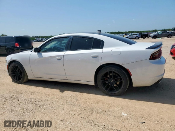2015 Dodge Charger SXT with VIN 2C3CDXHG0FH862901, listed as a Copart auction lot 61402225 with 128,926 mi miles and Salvage title. Bid and sale history available at DreamBid. Image 2.