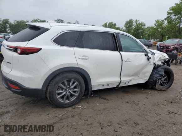 2021 Mazda CX-9 Touring with VIN JM3TCBCY1M0517709, listed as a Copart auction lot 57624945 with 64,081 mi miles and Salvage title. Bid and sale history available at DreamBid. Image 3.