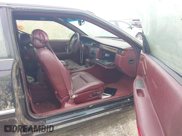 1997 Cadillac Eldorado ESC with VIN 1G6EL12Y8VU617784, listed as a IAAI auction lot 42214333 with Not Provided miles and . Bid and sale history available at DreamBid. Image 5.