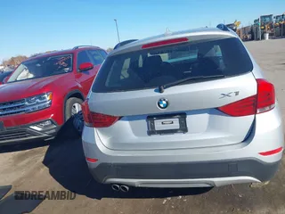 2013 BMW X1 xDrive28i z VIN WBAVL1C52DVR91900, wystawiony jako IAAI lot #40697726 z przebiegiem 115 200 mil mil oraz . Historia ofert i sprzedaży dostępna na DreamBid. Obrazek 16.