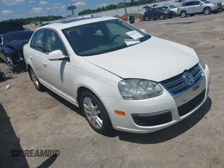 2005 Volkswagen Jetta z VIN 3VWST71K85M631752, wystawiony jako IAAI lot #42839140 z przebiegiem Nie podano mil oraz . Historia ofert i sprzedaży dostępna na DreamBid. Obrazek 1.