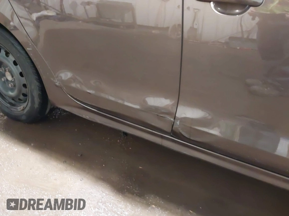 2014 Volkswagen Jetta TDI w/Premium with VIN 3VWLL7AJ1EM358214, listed as a IAAI auction lot 42148435 with 174,923 mi miles and . Bid and sale history available at DreamBid. Image 18.