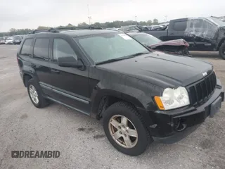 2007 Jeep Grand Cherokee Laredo z VIN 1J8GR48KX7C645449, wystawiony jako IAAI lot #41738110 z przebiegiem 163 746 mil mil oraz . Historia ofert i sprzedaży dostępna na DreamBid. Obrazek 1.
