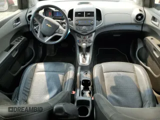 2012 Chevrolet Sonic LTZ with VIN 1G1JE6SH7C4111176, listed as a Copart auction lot 59002575 with 116,640 mi miles and Salvage title. Bid and sale history available at DreamBid. Image 8.