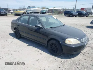 2000 Honda Civic LX with VIN 1HGEJ6670YL065386, listed as a IAAI auction lot 42199165 with 162,758 mi miles. Bid and sale history available at carsss.com. Image 1.