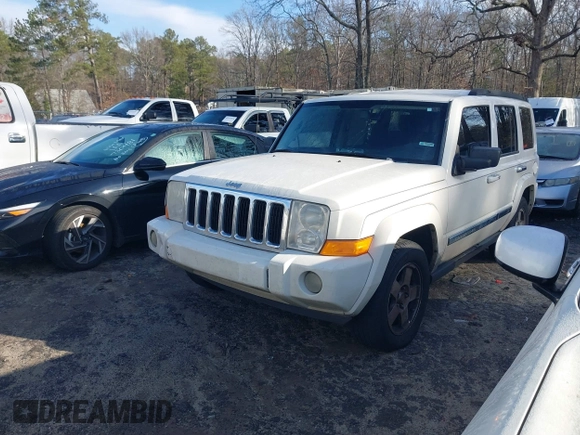2010 Jeep Commander Sport with VIN 1J4RH4GK1AC122505, listed as a IAAI auction lot 41222229 with 244,001 mi miles and . Bid and sale history available at DreamBid. Image 2.