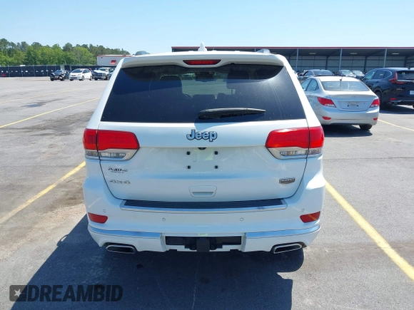 2015 Jeep Grand Cherokee Summit with VIN 1C4RJFJG1FC797711, listed as a IAAI auction lot 42026431 with 101,075 mi miles and . Bid and sale history available at DreamBid. Image 17.