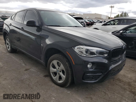 2015 BMW X6 xDrive35i with VIN 5UXKU2C54F0N75919, listed as a Copart auction lot 43558254 with 143,246 mi miles and . Bid and sale history available at DreamBid. Image 4.