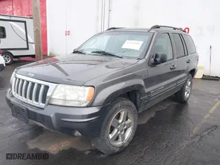 2004 Jeep Grand Cherokee Limited with VIN 1J4GW58N34C399673, listed as a IAAI auction lot 41976505 with 194,005 mi miles. Bid and sale history available at carsss.com. Image 2.