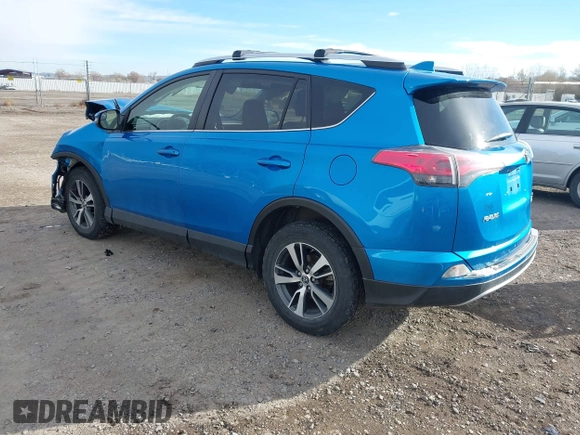 2016 Toyota RAV4 XLE with VIN JTMRFREV4GD186580, listed as a IAAI auction lot 40916703 with 117,120 mi miles and . Bid and sale history available at DreamBid. Image 3.