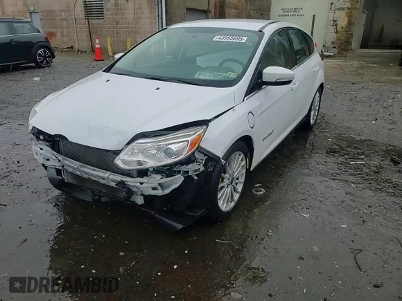 2016 Ford Focus Electric z VIN 1FADP3R42GL234563, wystawiony jako Copart lot #43955695 z przebiegiem 66 636 mil mil oraz Szkoda całkowita • Salvage title. Historia ofert i sprzedaży dostępna na DreamBid. Obrazek 11.