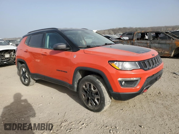 2018 Jeep Compass Trailhawk with VIN 3C4NJDDB4JT130342, listed as a Copart auction lot 49172715 with 112,618 mi miles and Salvage Title. Bid and sale history available at carsss.com. Image 4.