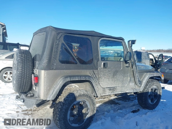 2004 Jeep Wrangler Sahara with VIN 1J4FA59S94P731123, listed as a IAAI auction lot 41288284 with 138,515 mi miles and . Bid and sale history available at DreamBid. Image 13.