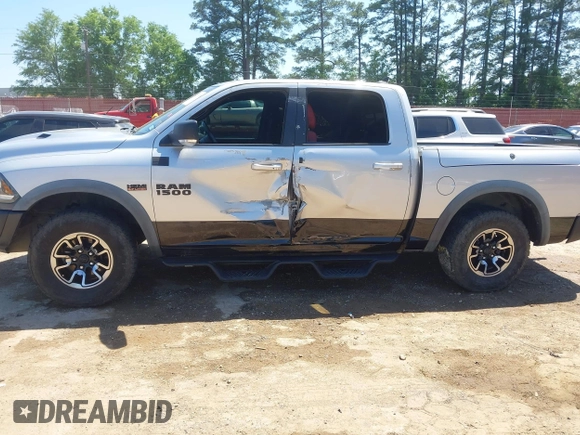 2016 Ram 1500 Rebel z VIN 1C6RR7YT7GS185173, wystawiony jako IAAI lot #42033684 z przebiegiem 152 758 mil mil oraz . Historia ofert i sprzedaży dostępna na DreamBid. Obrazek 14.