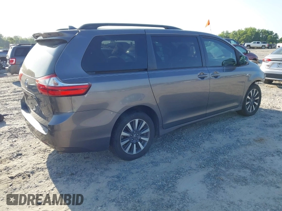 2018 Toyota Sienna LE with VIN 5TDJZ3DC3JS190746, listed as a IAAI auction lot 42161562 with 180,000 mi miles and . Bid and sale history available at DreamBid. Image 4.