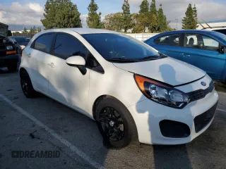 2015 Kia Rio LX with VIN KNADM5A39F6460207, listed as a Copart auction lot 44464245 with 106,792 mi miles and Salvage Title. Bid and sale history available at carsss.com. Image 4.
