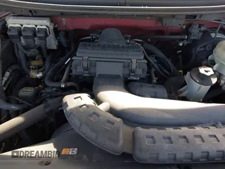 2005 Ford F-150 XLT with VIN 1FTPX12505FB69853, listed as a IAAI auction lot 42092756 with 330,699 mi miles. Bid and sale history available at carsss.com. Image 10.