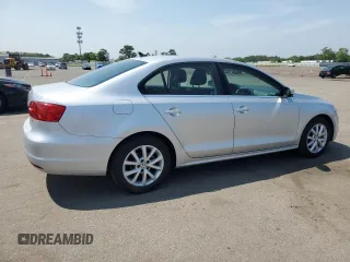 2013 Volkswagen Jetta SE with VIN 3VWDP7AJ6DM444111, listed as a Copart auction lot 60243665 with 47,005 mi miles and Salvage title. Bid and sale history available at DreamBid. Image 3.