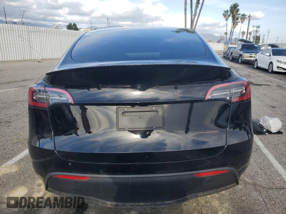 2022 Tesla Model Y Performance with VIN 7SAYGDEF9NF455508, listed as a Copart auction lot 51517205 with Not provided miles and Salvage title. Bid and sale history available at DreamBid. Image 6.