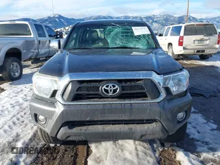 2013 Toyota Tacoma with VIN 3TMMU4FNXDM059768, listed as a IAAI auction lot 41375737 with 227,477 mi miles. Bid and sale history available at carsss.com. Image 12.