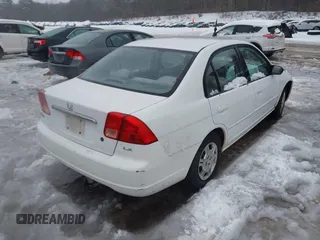 2002 Honda Civic LX with VIN 2HGES16592H517516, listed as a IAAI auction lot 41516218 with 146,957 mi miles and . Bid and sale history available at DreamBid. Image 4.