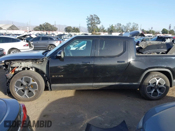 2023 Rivian R1T Adventure with VIN 7FCTGAAAXPN022097, listed as a IAAI auction lot 41235625 with 11,210 mi miles. Bid and sale history available at carsss.com. Image 15.