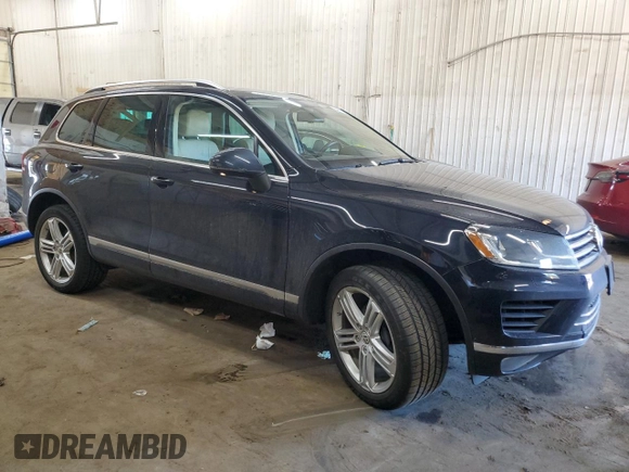 2015 Volkswagen Touareg Sport with VIN WVGEF9BP3FD003121, listed as a Copart auction lot 50572505 with 87,082 mi miles and Salvage title. Bid and sale history available at DreamBid. Image 4.