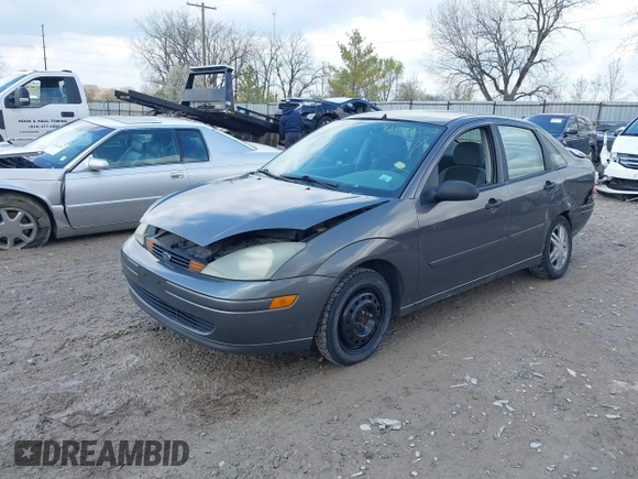 2004 Ford Focus SE with VIN 1FAFP34334W177338, listed as a IAAI auction lot 42003202 with 190,581 mi miles and . Bid and sale history available at DreamBid. Image 2.
