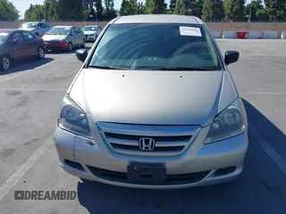 2006 Honda Odyssey LX with VIN 5FNRL38226B085181, listed as a IAAI auction lot 42594621 with 210,616 mi miles and . Bid and sale history available at DreamBid. Image 6.