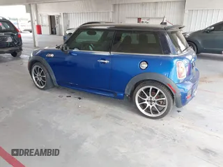 2007 MINI Hardtop S with VIN WMWMF73557TT86128, listed as a IAAI auction lot 42417311 with 114,911 mi miles and . Bid and sale history available at DreamBid. Image 3.