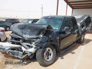 1999 Ford F-150 XL with VIN 1FTRX08L3XKB12260, listed as a IAAI auction lot 42244781 with Not provided miles and . Bid and sale history available at DreamBid. Image 6.